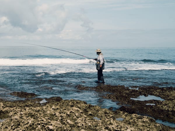 Reel-less Angler Fishing the Tide Pool near National Museum of Marine Biology and Aquarium, Taiwan
